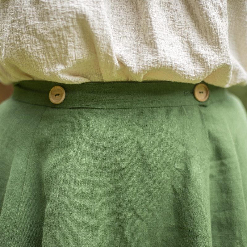 jupe verte boutons